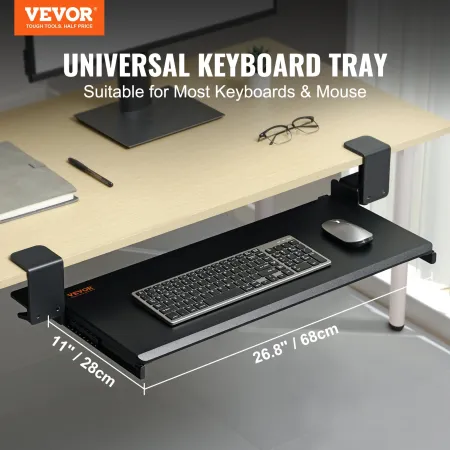 Klem på tastaturbakken under skrivebord