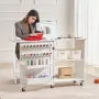 Folding Sewing Table, Multipurpose Sewing Machine Table with Compact Design, Wheels, Shelves, Storage Trays, Wooden Pegs, and Ma
