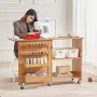 Folding Sewing Table, Multipurpose Sewing Machine Table with Compact Design, Wheels, Shelves, Storage Trays, Wooden Pegs, and Ma